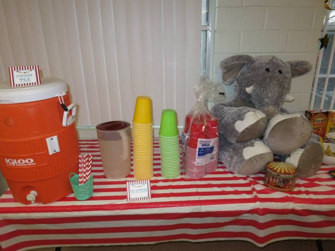 A big stuffed elephant was the centerpiece for the drink and snack table